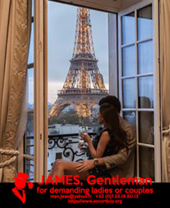 romantic couple male escort at the window in front of tour eiffel